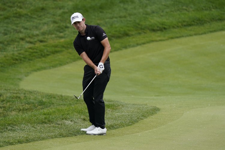 Cantlay wins a playoff at Memorial without Rahm