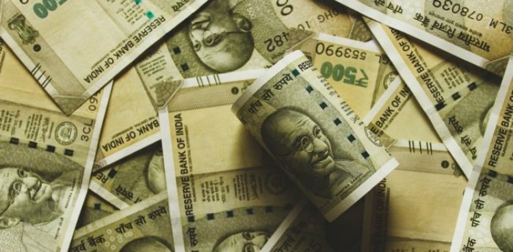 Rupee pares initial gains, falls 21 paise to close at 81.59 against dollar