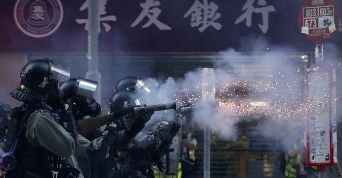 Hong Kong protesters call for city-wide vigils after student dies