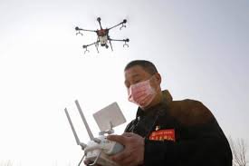 China deploys drones to scold people not wearing masks